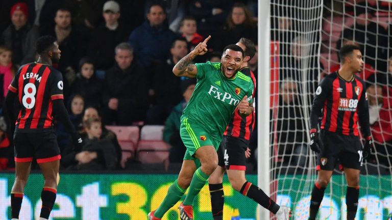 Troy Deeney celebrates the first of his tow goals