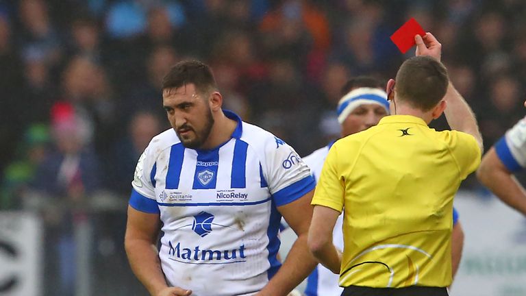 Castres' French prop Tudor Stroe (L) is shown a red card by referee George Clancy for violent play during the European Rugby Champions Cup pool 2 rugby union match between Exeter Chiefs and Castres at Sandy Park Stadium in Exeter, south west England, on January 13, 2019.