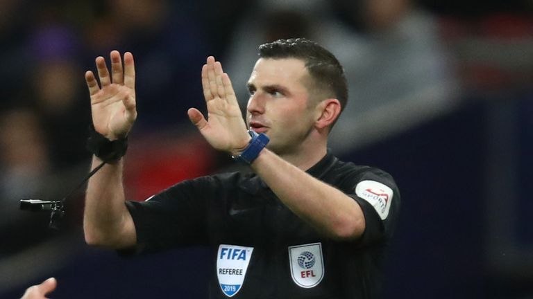 Referee Michael Oliver gesutres for VAR as Cesar Azpilicueta of Chelsea reacts during the Carabao Cup Semi-Final First Leg match between Tottenham Hotspur and Chelsea at Wembley Stadium on January 8, 2019 in London, England.
