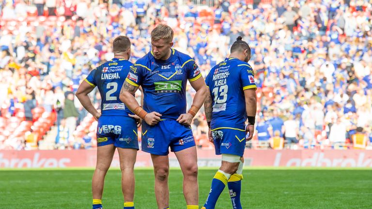 Picture by Allan McKenzie/SWpix.com - 25/08/2018 - Rugby League - Ladbrokes Challenge Cup Final - Catalans Dragons v Warrington Wolves - Wembley Stadium, London, England - Warrington Wolves players Tom Lineham, Mike Cooper and Ben Murdoch-Masila dejected after their sides loss to the Catalan Dragons.