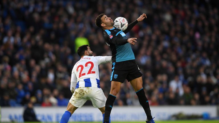 Hal Robson-Kanu of West Bromwich Albion controls the ball under pressure from Martin Montoya of Brighton and Hove Albion during the FA Cup Fourth Round match between Brighton & Hove Albion and West Bromwich Albion at Emirates Stadium on January 26, 2019 in London, United Kingdom