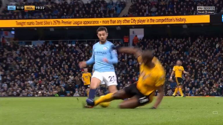 Willy Boly was sent off for this tackle on Bernardo Silva in the first half