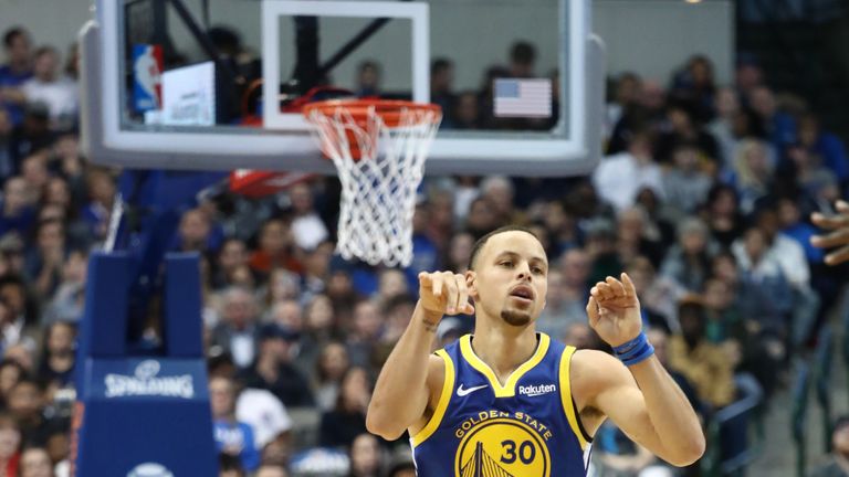 Stephen Curry celebrates a three-pointer against Dallas