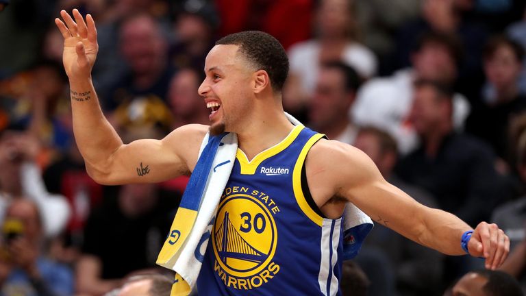 A joyous Stephen Curry celebrates during the Golden State Warriors rout of the Denver Nuggets