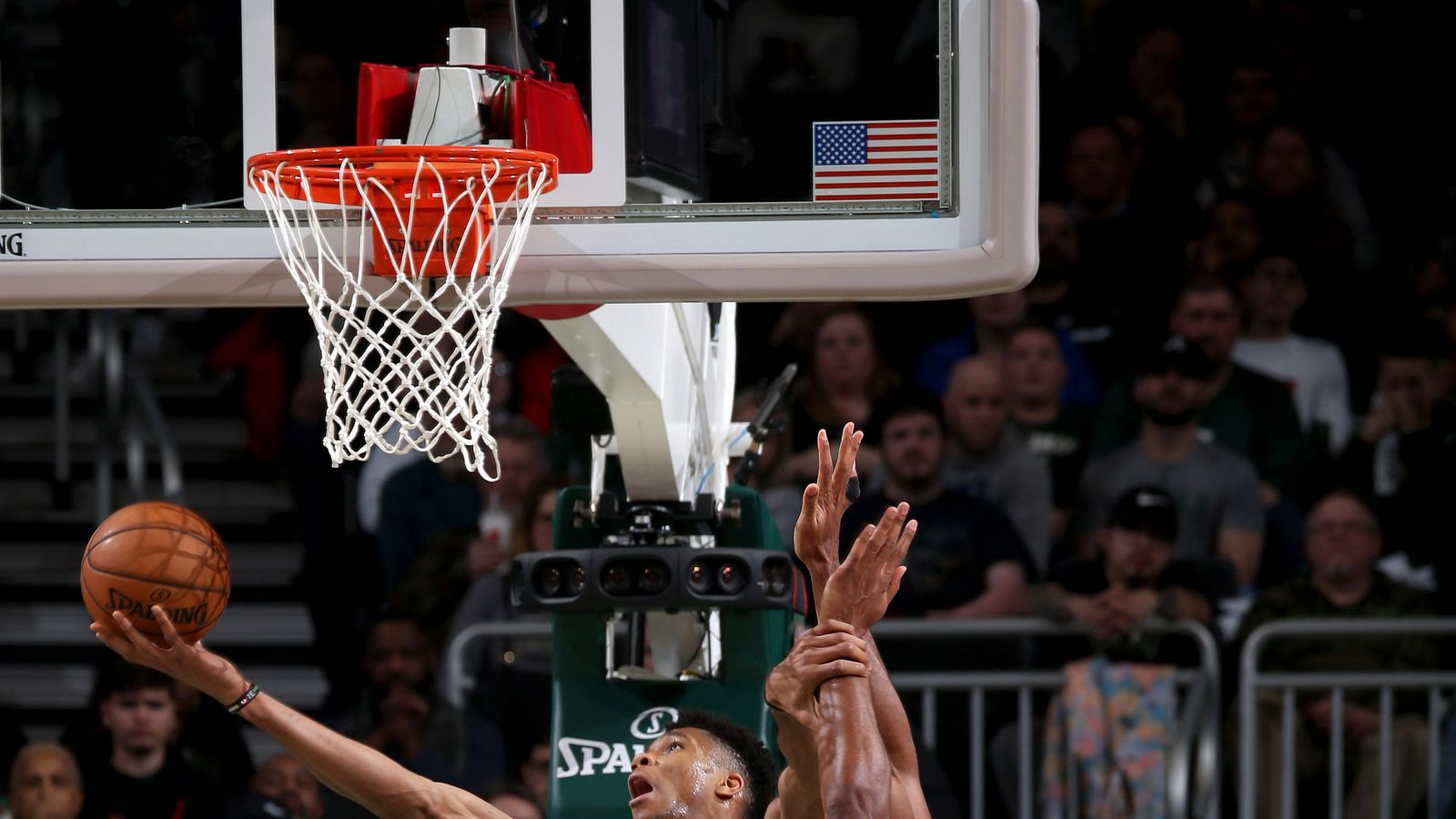 tatum dunks on giannis