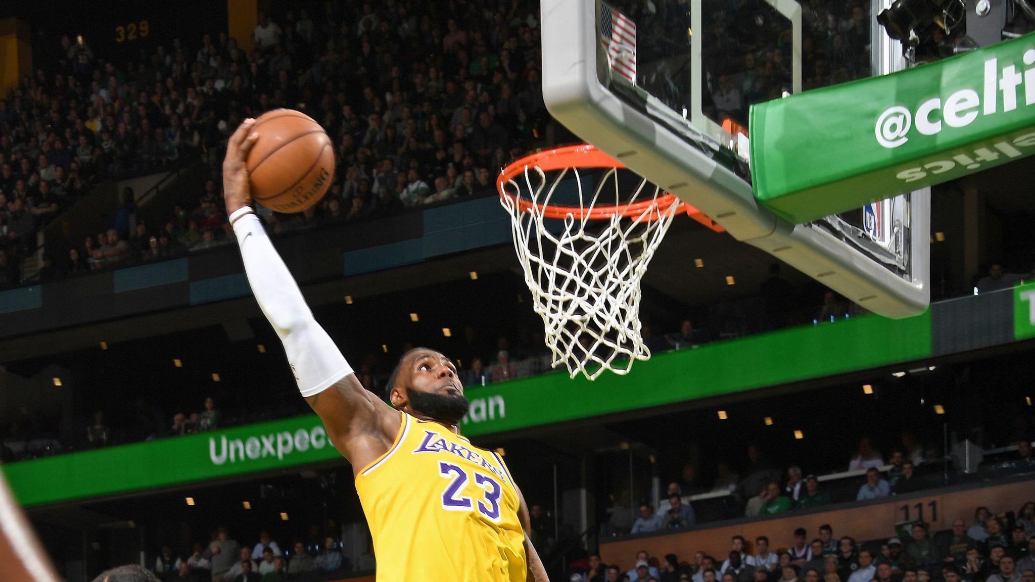 LeBron James hammers home alley-oop dunk as Los Angeles Lakers defeat  Boston Celtics, NBA News