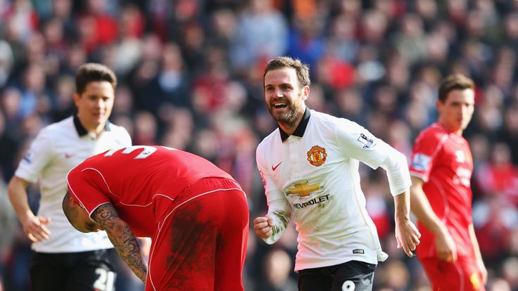 Juan Mata runs towards Manchester United fans in celebration after his second goal against Liverpool in March 2015