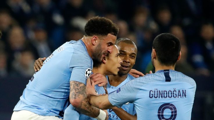 Leroy Sane celebrates with his team-mates after scoring for Manchester City against Schalke in the Champions League