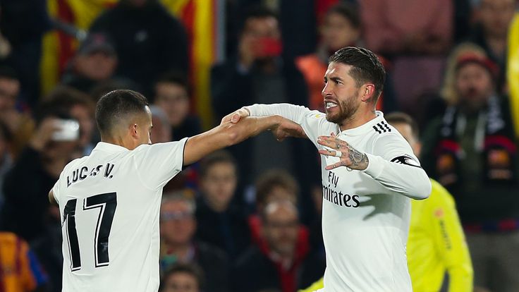 Lucas Vazquez of Real Madrid CF celebrates with his team-mate Sergio Ramos after scoring his team's first goal during the Copa del Semi Final first leg match between Barcelona and Real Madrid at Nou Camp on February 06, 2019 in Barcelona, Spain