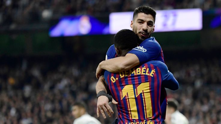 Luis Suarez scored twice as Barcelona beat Real Madrid to reach the Copa del Rey final