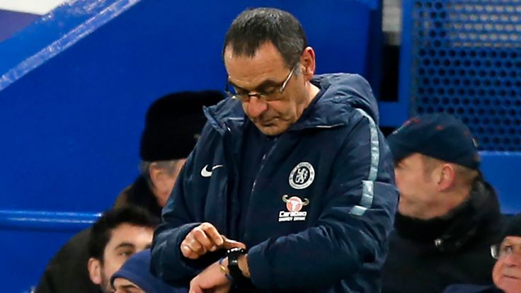 Maurizio Sarri looks at his watch during Chelsea's FA Cup defeat to Manchester United at Stamford Bridge in February 2019