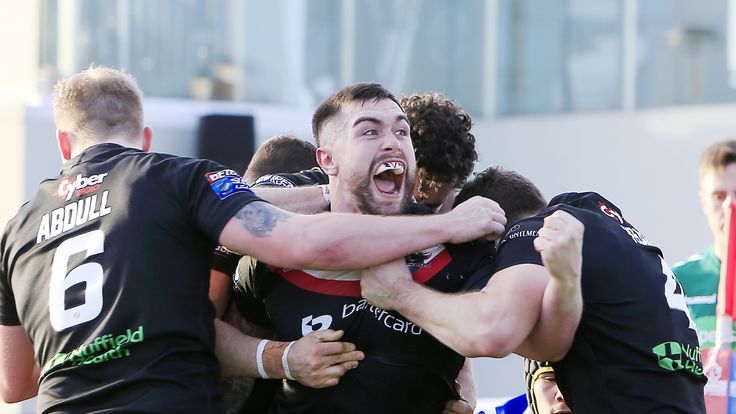 London Broncos' Matty Fozard celebrates a score against Super League rivals Wakefield