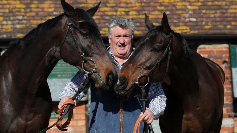 Trainer Paul Nicholls with Clan Des Obeaux (left) and Frodon (right) during the visit to Paul Nicholls' Yard at Manor Farm Stables, Ditcheat.