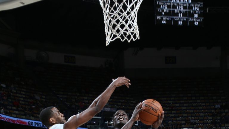 Darren Collison attacks the basket against New Orleans