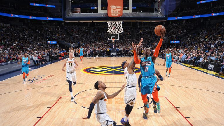 Dennis Schroder attacks the rim against Denver