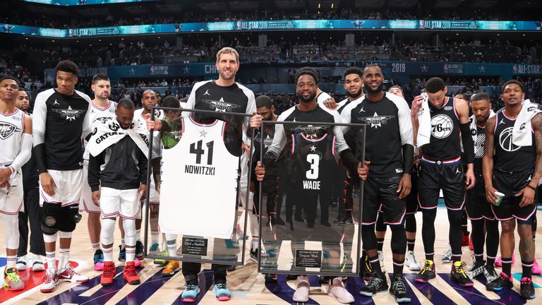 Dirk Nowitzki and Dwyane Wade are honoured by their fellow All-Stars