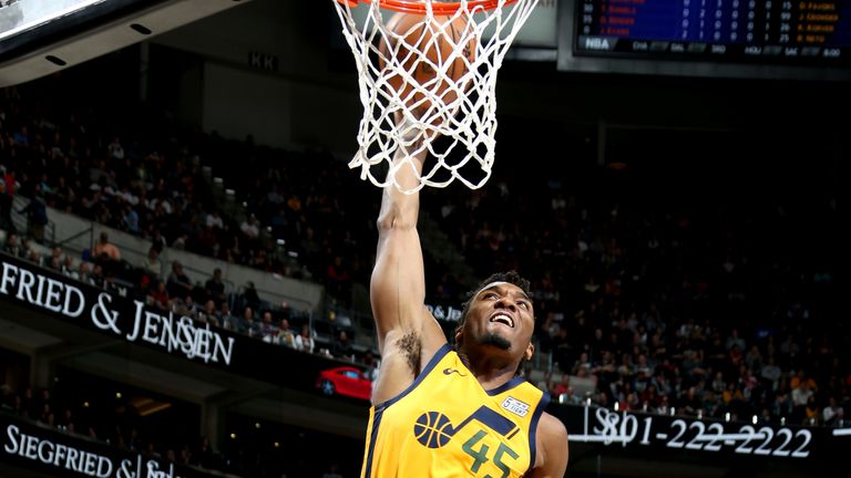 Donovan Mitchell rams home a dunk