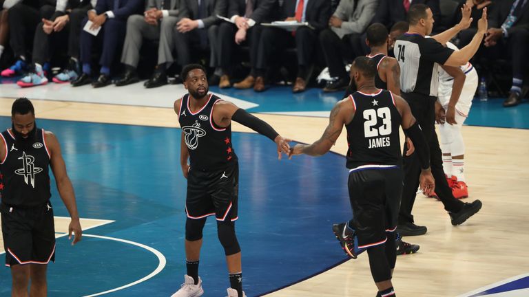 Dwyane Wade and LeBron James connect during the All-Star Game