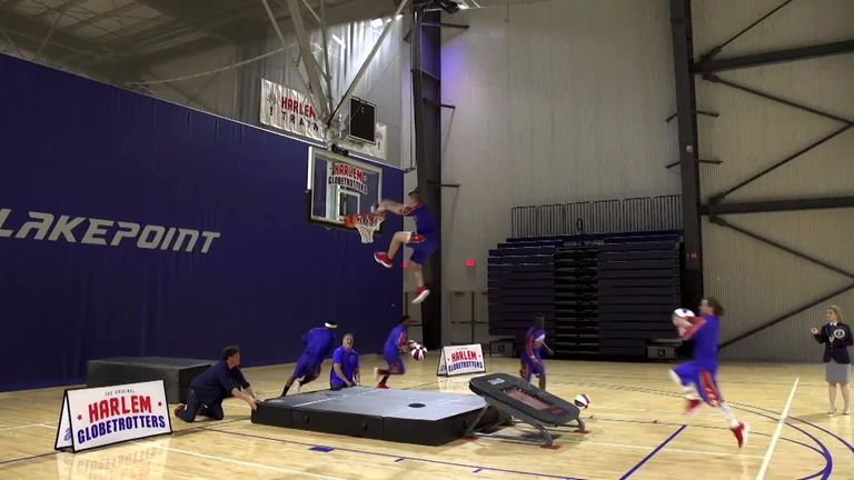 The most under-the-leg tumbles by a female, the most blindfolded slam dunks, and the most under-the-leg slam dunks by a trampoline team... the Harlem Globetrotters break world records