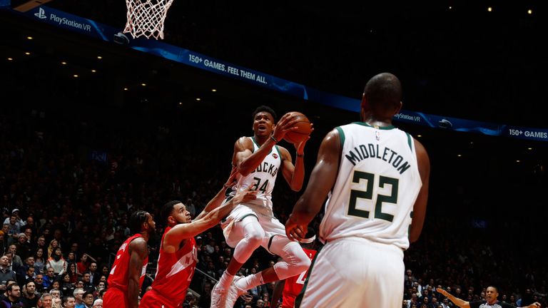 Giannis Antetokounmpo attacks the rim against Toronto