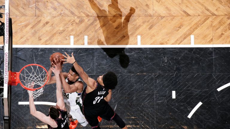 Giannis Antetokounmpo scores at the rim against Brooklyn