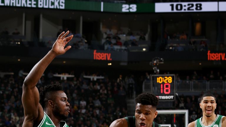 Giannis Antetokounmpo battles the Celtics defense