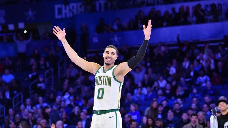 Jayson Tatum celebrates after hitting a halfcourt shot to win the All-Star Skills Challenge