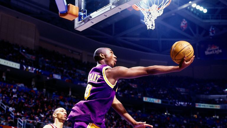 Kobe Bryant lofts a circus shot at All-Star Weekend