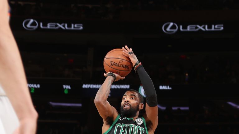 Kyrie Irving fires a jump shot against the New York Knicks