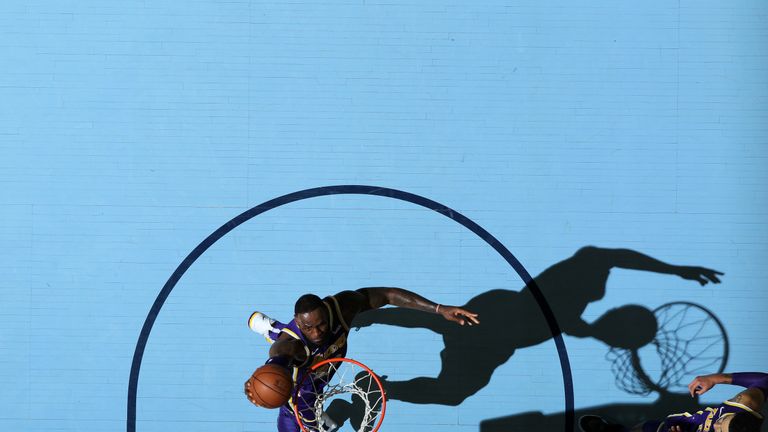 LeBron James scores at the rim against the Memphis Grizzlies