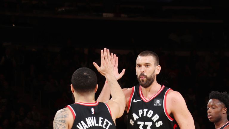 Marc Gasol high-fives Raptors team-mate Fred VanVleet