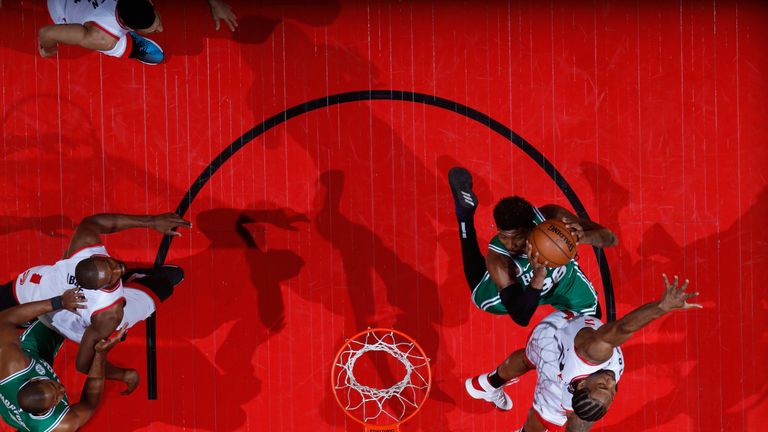 Marcus Smart rises to the rim against the Raptors