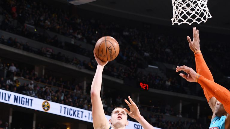 Nikola Jokic scores with a lay-up against Oklahoma City Thunder