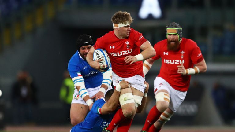  Aaron Wainwright of Wales runs with the ball