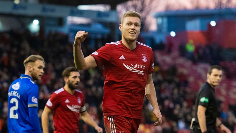 Sam Cosgrove's double against Queen of the South made sure of Aberdeen's place in the quarter-finals