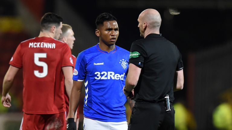 06/02/19 LADBROKES PREMIERSHIP.ABERDEEN V RANGERS (2-4).PITTODRIE - ABERDEEN.Referee Bobby Madden and Rangers’ Alfredo Morelos