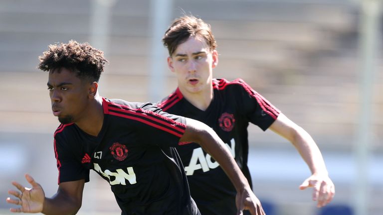 Angel Gomes (L) and James Garner of Manchester United in action during a Manchester United pre-season training session at UCLA on July 20, 2018 in Los Angeles, California. 