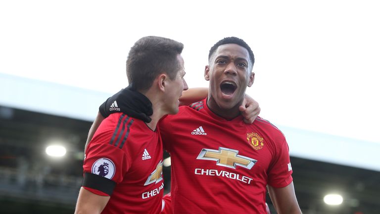 Anthony Martial celebrates with Ander Herrera after doubling Manchester United's lead