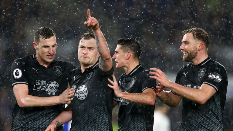 Ashley Barnes of Burnley celebrates with team-mates after scoring his team's third goal