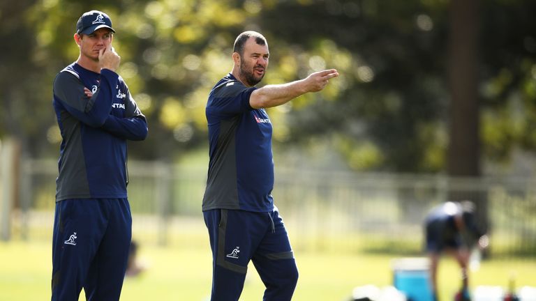 Stephen Larkham (left) has had 'differences' with head coach Michael Cheika (right) on attacking strategy and game philosophy