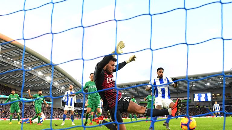 Watford goalkeeper Ben Foster makes a save against Brighton at the AMEX Stadium