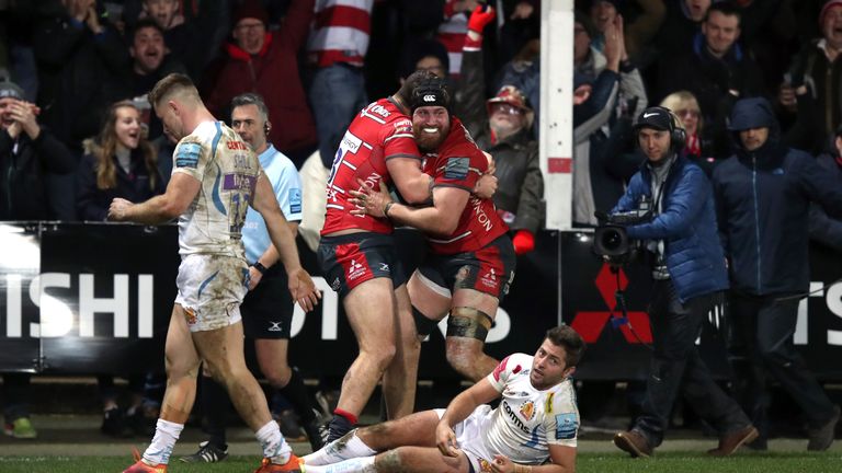 Ben Morgan (R) celebrates scoring Gloucester's third try 