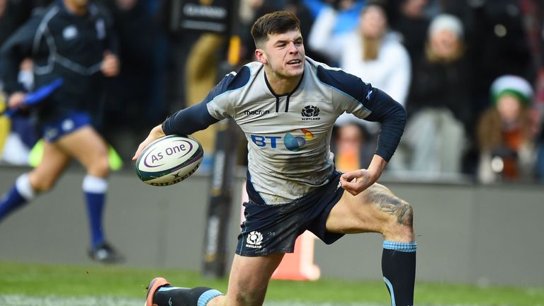 Blair Kinghorn celebrates after scoring his third try