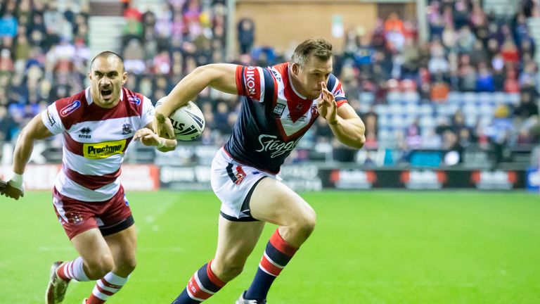 Brett Morris evades Wigan tacklers to score his first try for Sydney Roosters