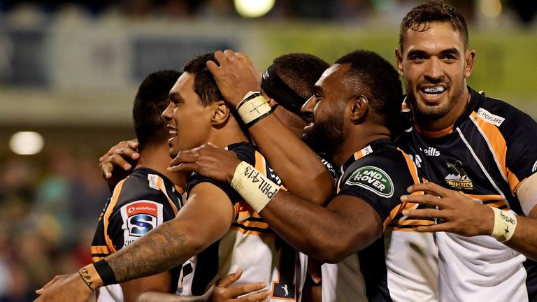 The Brumbies celebrate during their convincing victory over the Chiefs.