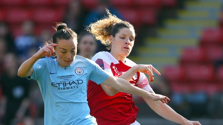 Manchester City's Caroline Weir and Arsenal's Kim Little in action during the Women's League Cup final
