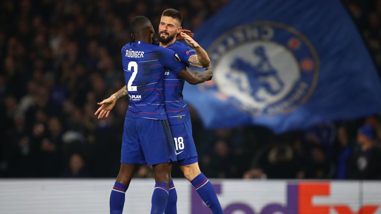 Chelsea striker Olivier Giroud celebrates after scoring his team's first goal with Antonio Rudiger against Malmo