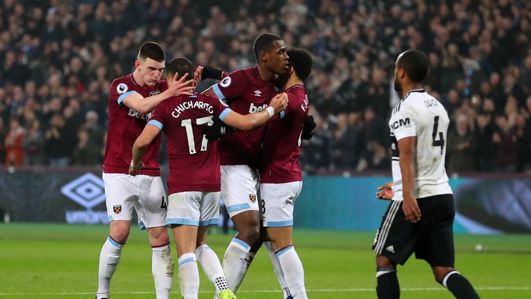 Javier Hernandez of West Ham United (2L) celebrates with his team-mates after scoring his side's first goal during the Premier League match between West Ham United and Fulham FC at the London Stadium on February 22, 2019 in London, United Kingdom