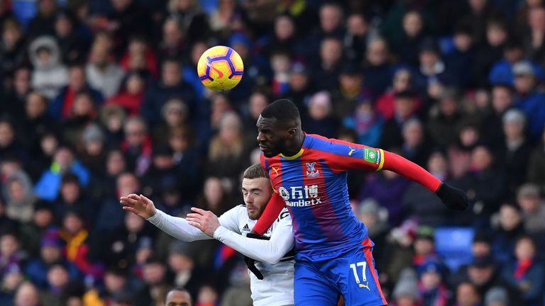 Christian Benteke goes up for a header against Calum Chambers