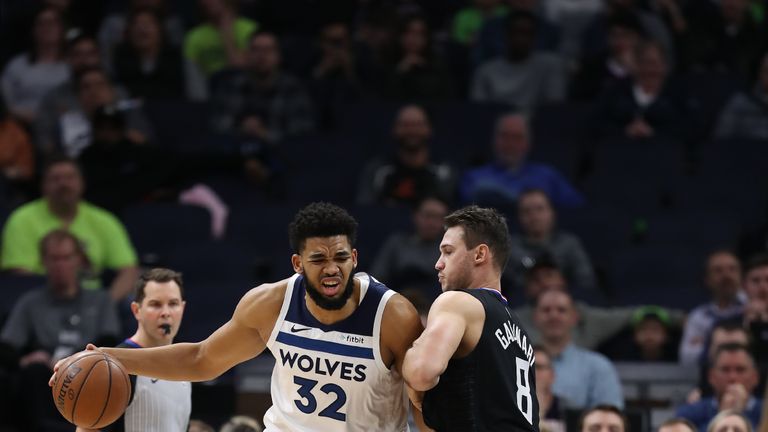 MINNEAPOLIS, MN - FEBRUARY 11: Karl-Anthony Towns #32 of the Minnesota Timberwolves handles the ball against the LA Clippers on February 11, 2019 at Target Center in Minneapolis, Minnesota. NOTE TO USER: User expressly acknowledges and agrees that, by downloading and or using this Photograph, user is consenting to the terms and conditions of the Getty Images License Agreement. Mandatory Copyright Notice: Copyright 2019 NBAE (Photo by Jordan Johnson/NBAE via Getty Images)